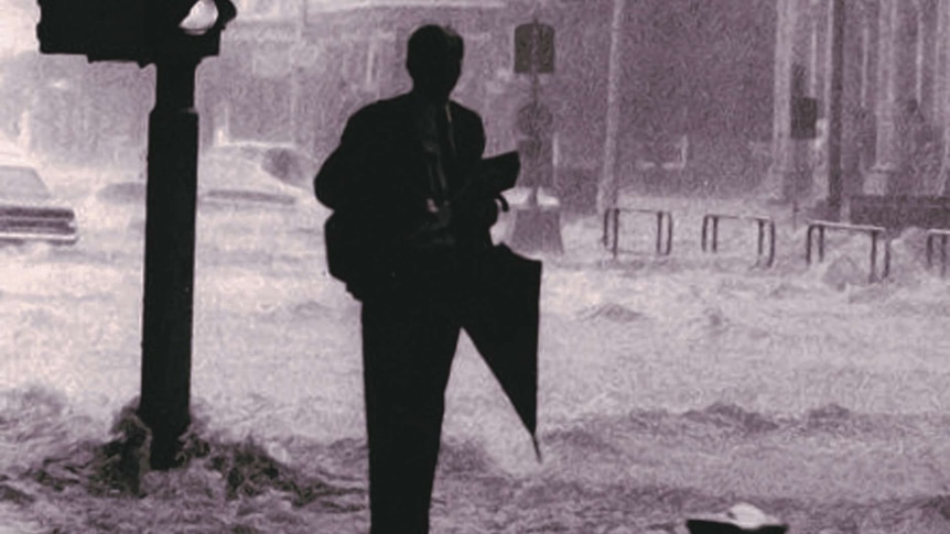 The book cover shows a black and white image of a man on a flooded city street.