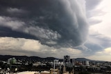 Storm clouds roll over Brisbane city.