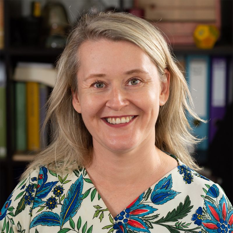 A portrait of Dr Rebecca English, a lecturer at QUT and a former teacher.