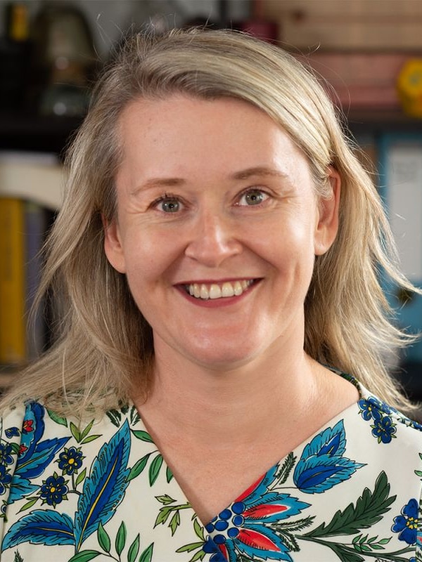 A portrait of Dr Rebecca English, a lecturer at QUT and a former teacher.