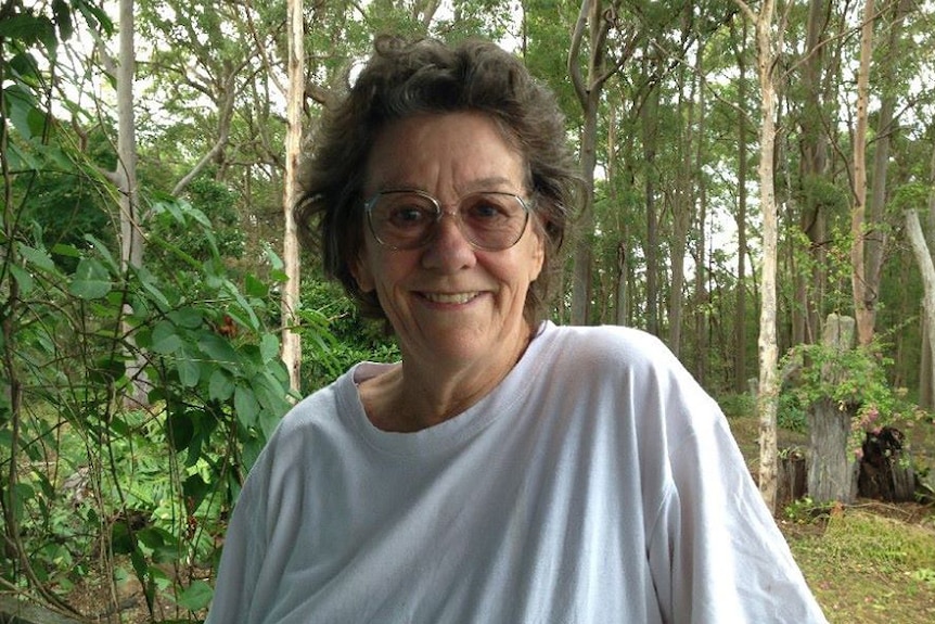 Headshot of Terrie Ridgway smiling at her property on Queensland's Sunshine Coast in 2020.
