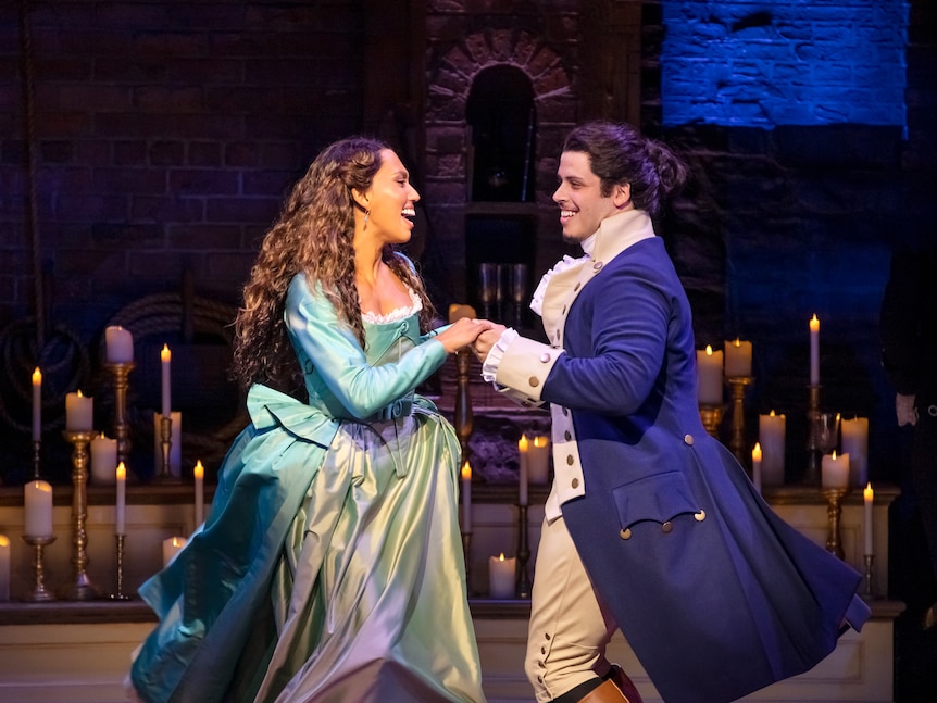 Actors Chloé Zuel and Jason Arrow as Eliza and Alexander Hamilton in Australian production of Hamilton