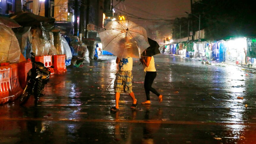 Typhoon Mangkhut makes landfall before dawn.