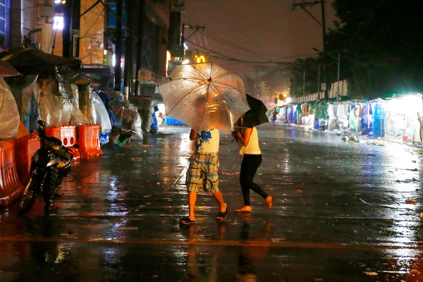 Typhoon Mangkhut makes landfall before dawn.