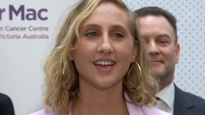 Lauren Krelsham speaks at a press conference at the Peter MacCallum Cancer Centre in Melbourne.