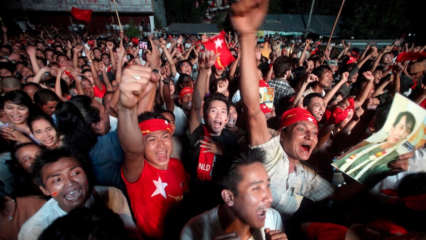 Supporters of Aung San Suu Kyi celebrate in Rangoon.