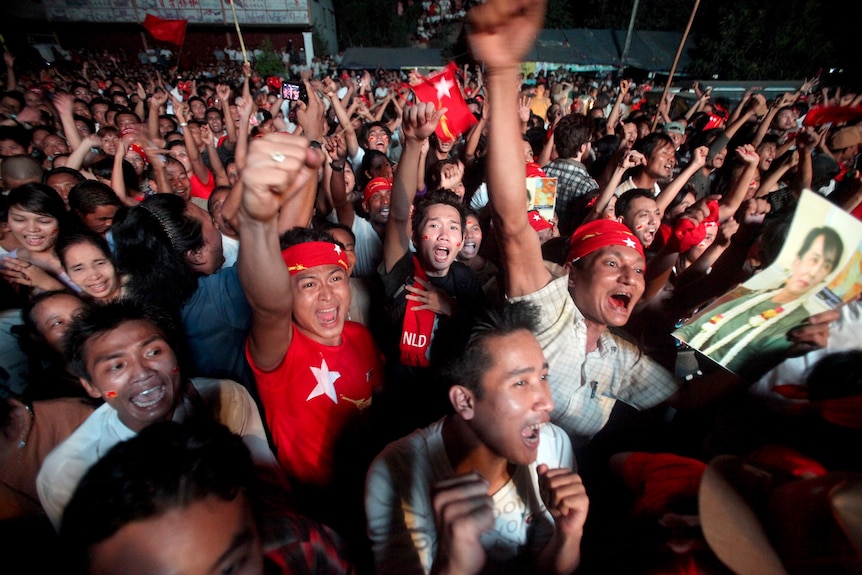 Supporters of Aung San Suu Kyi celebrate in Rangoon.