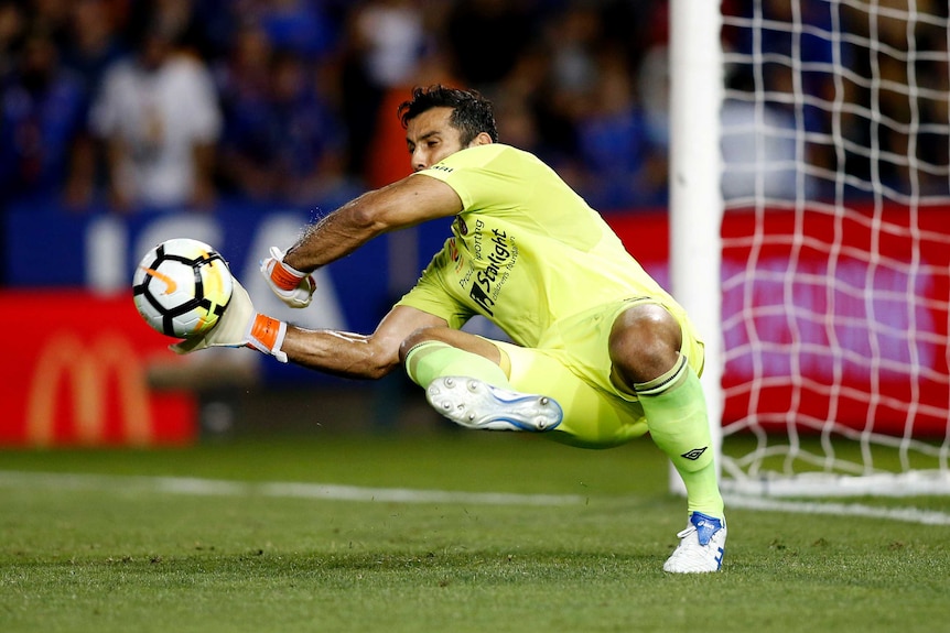 Brisbane Roar's Jamie Young makes a save