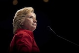 Hillary Clinton pauses and looks at the crowd during a rally.