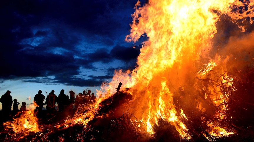 Spectators watch the traditional Easter bonfire in Wartjenstedt, Germany.