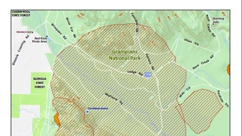 A map mainly featuring green and brown, showing areas where rock climbing is banned.