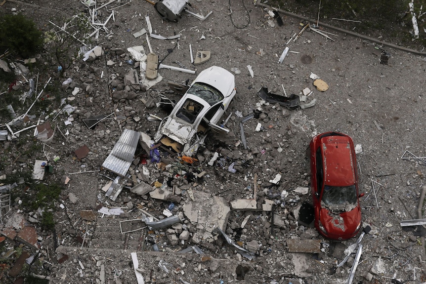 View from above of two damaged cars.