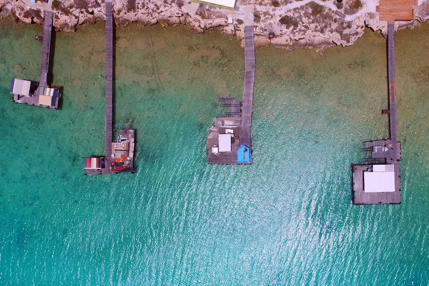 A photo of Pigeon Island rock lobster fishing jettys taken from the air