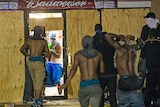 Looting at a liquor store in Ferguson