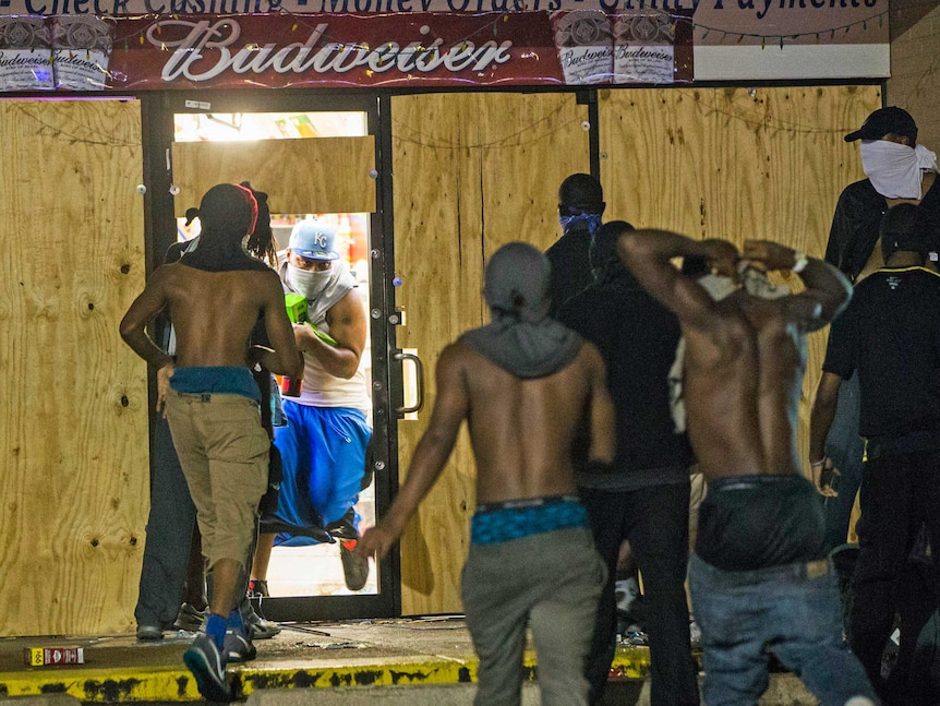 Looting at a liquor store in Ferguson