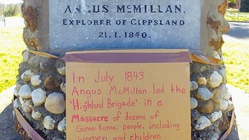 Stratford Angus McMillan cairn with sign detailing his link to aboriginal massacres in Gippsland