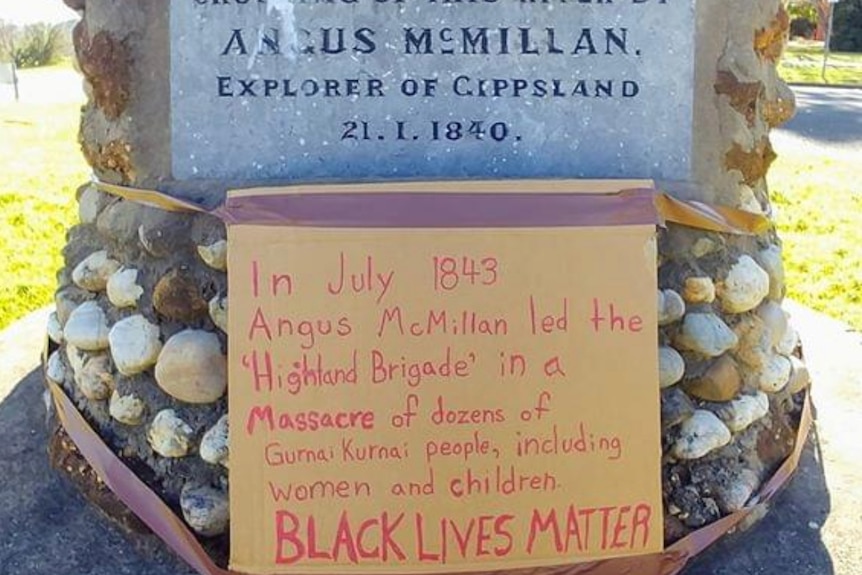 Stratford Angus McMillan cairn with sign detailing his link to aboriginal massacres in Gippsland