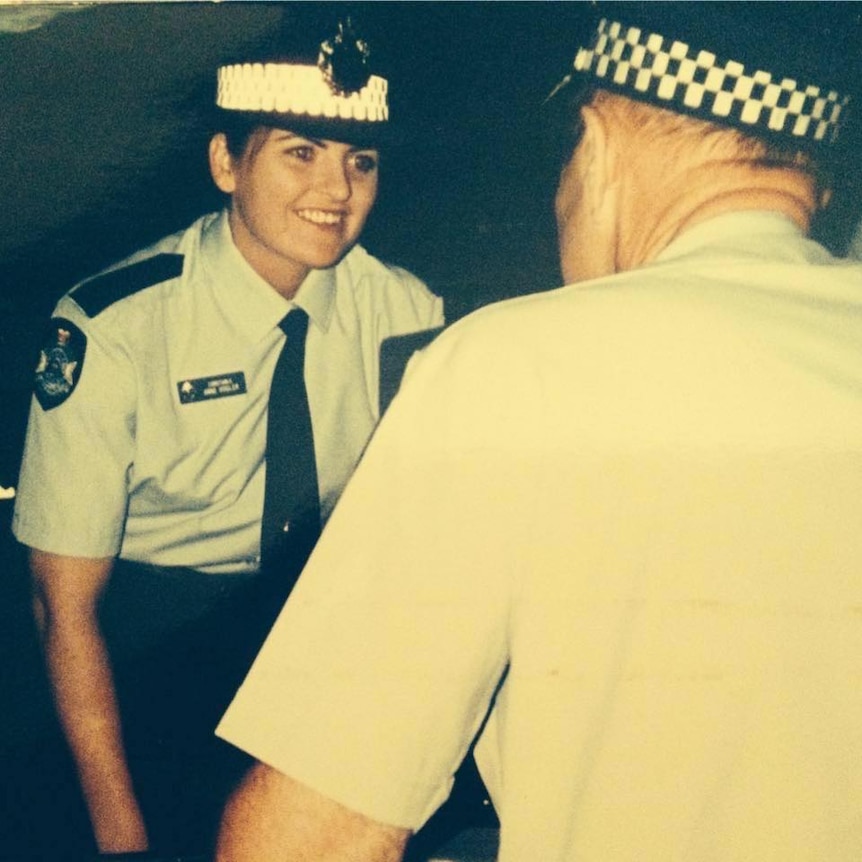 An aged photo of a female police officer