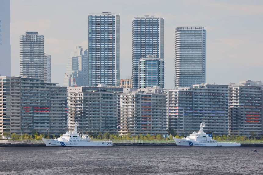 Tokyo 2020 Olympic Village on Harumi Island flanked by Japan Coast Guard ship