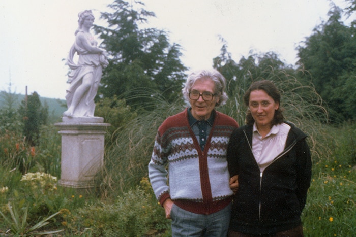 James Lovelock and Lynn Margulis standing in the garden looking at the camera