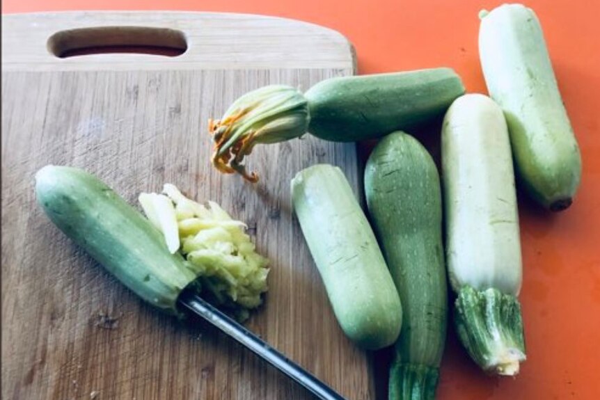 light green zucchini on a chopping board
