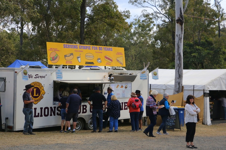 A Lions Club food van serves customers