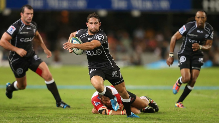 The Sharks' Cobus Reinach goes over for a try against the Lions in Durban.