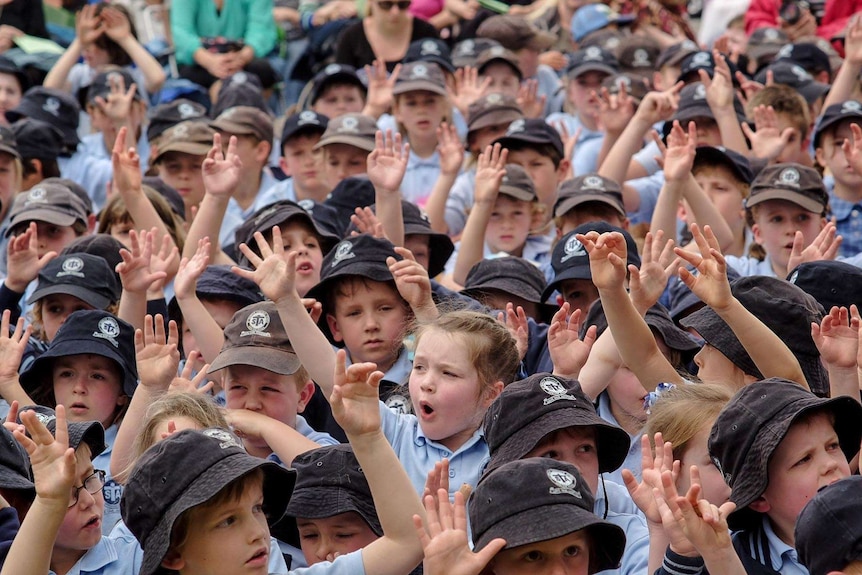 Students at bushfires anniversary ceremony