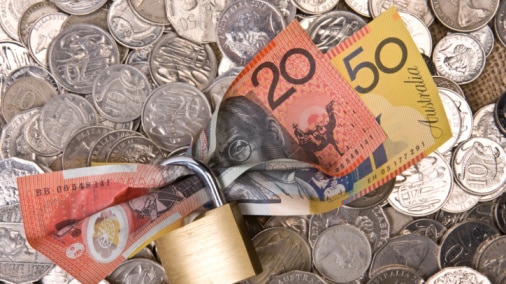 Money locked in a padlock (Thinkstock: iStockphoto)