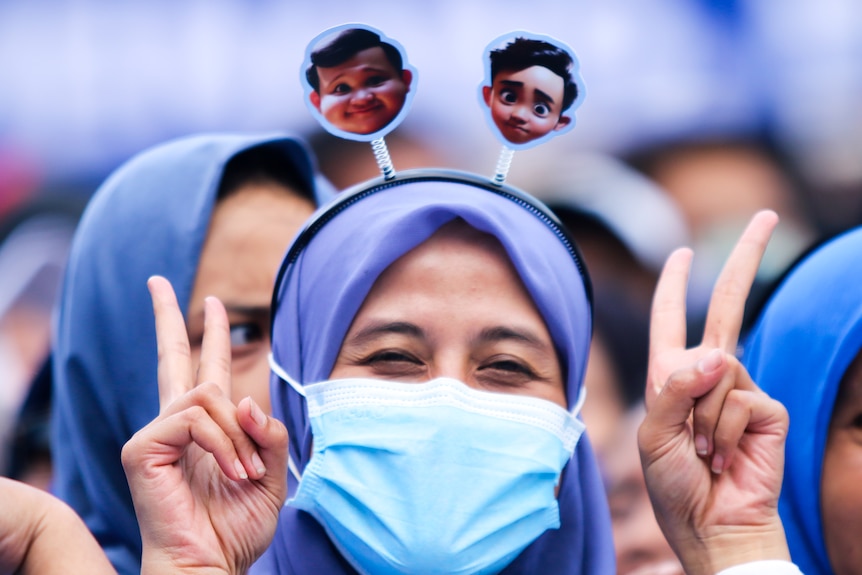 A woman at a rally during the Indonesian election campaign