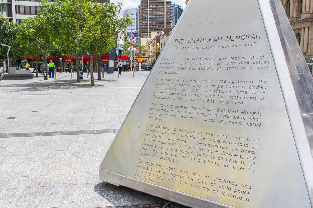 Hanukkah marked in Brisbane as giant menorah burns bright in CBD during