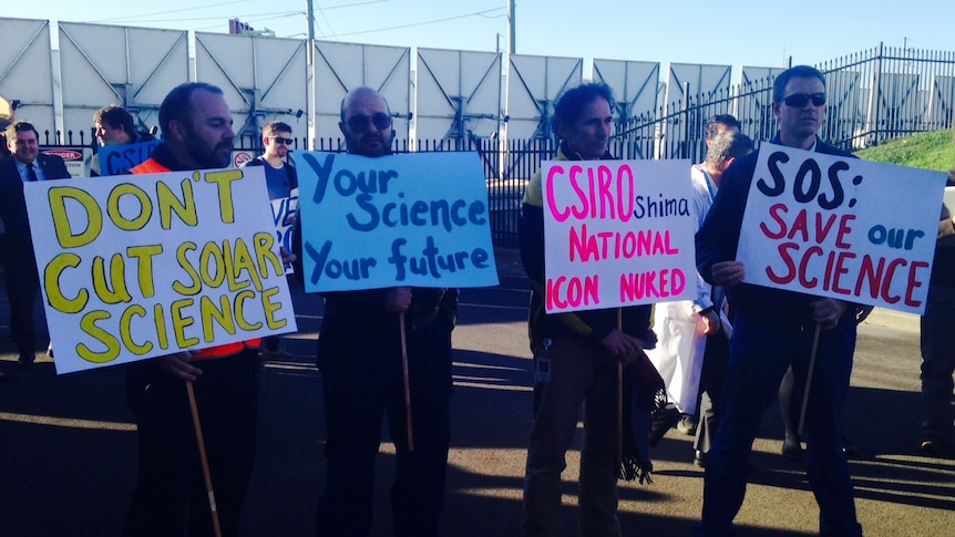 CSIRO scientists and support staff rally outside the organisation's Energy Centre in Newcastle.