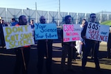 CSIRO scientists and support staff rally outside the organisation's Energy Centre in Newcastle.