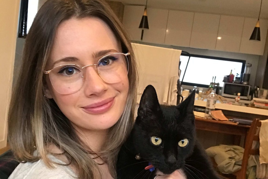 Katie Brebner-Griffin with her cat