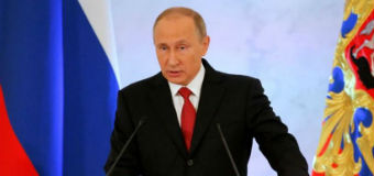 Vladimir Putin giving a speech.