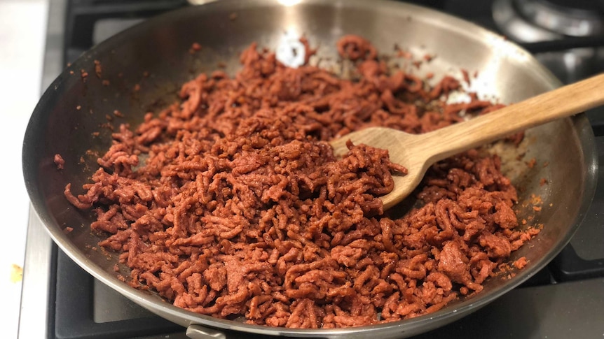 Cooking Funky Fields plant-based "minced" in a pan.