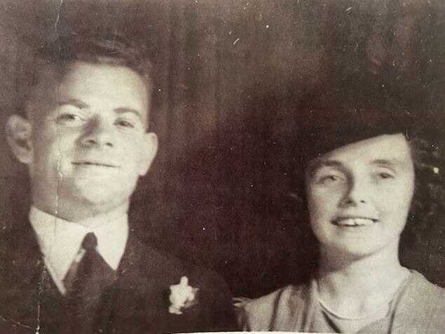 Old black and white photograph of a man and woman.