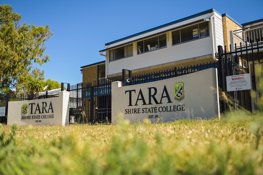 a two storey school with signs reading 'tara state shire college'.