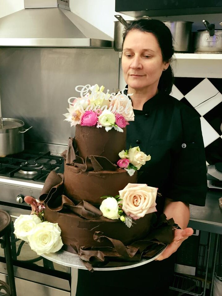 Jodie Van Der Velden with giant chocolate cake
