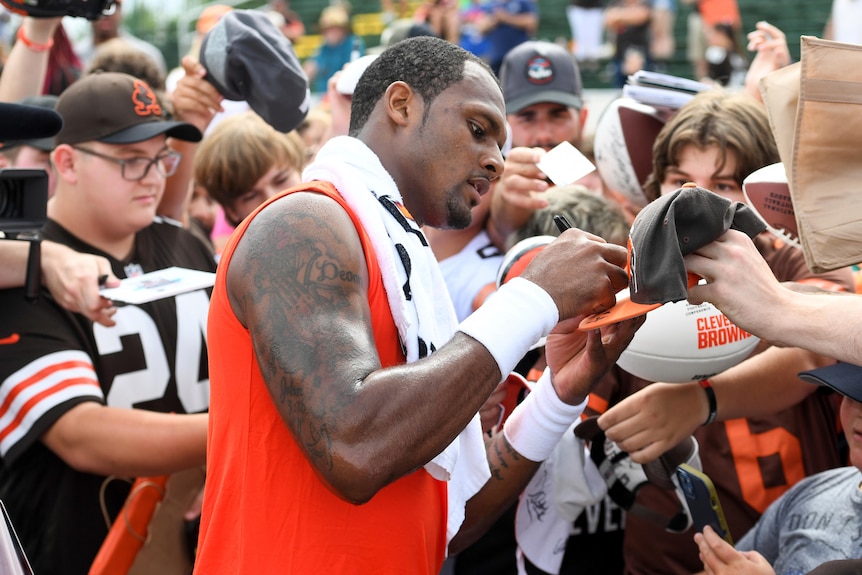 Deshaun Watson signs autographs at Cleveland Browns training.
