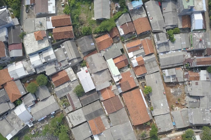 A drone shot of rooftops in Indonesia