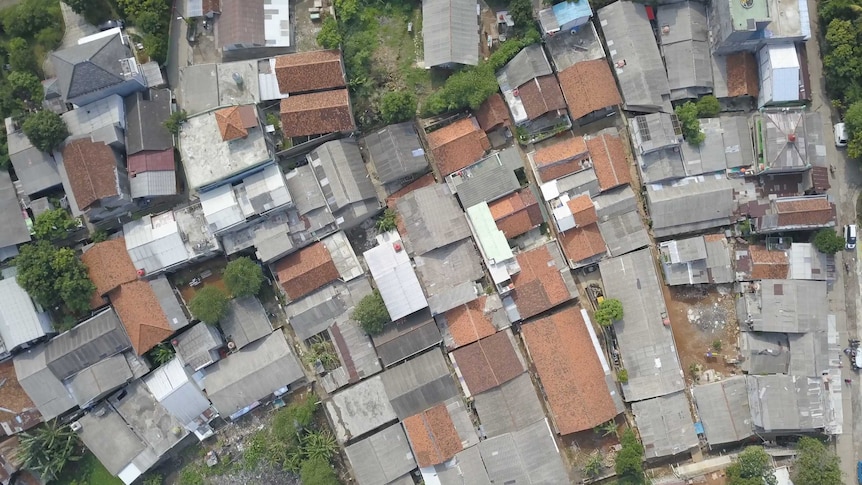 A drone shot of rooftops in Indonesia