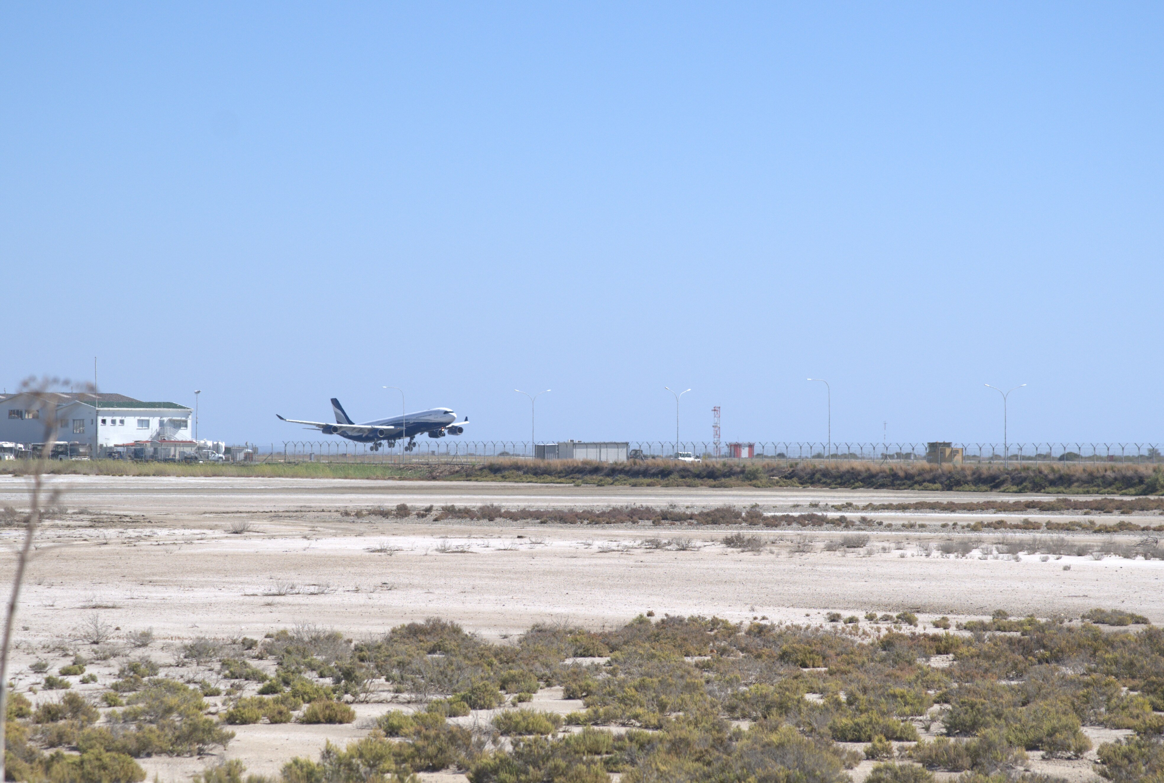 a plane landing on a tarmac in Cyprus