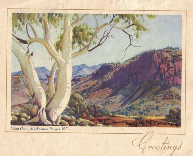 A Christmas card with watercolour painting of a landscape