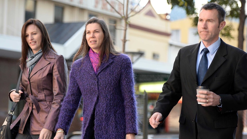 Gerard Baden-Clay's sister Olivia Walton (centre) and brother Adam arrive at the Supreme Court.
