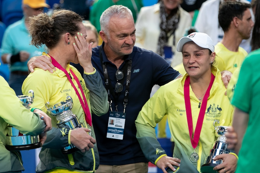 Wally Masur with Sam Stosur and Ash Barty.  The French team wins the Fed Cup tennis final in Perth,