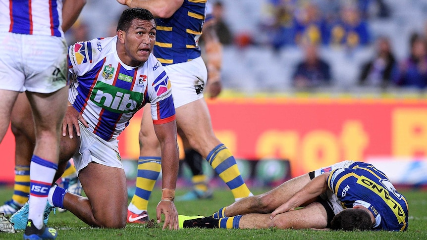 Mitchell Moses stricken on the ground with injury