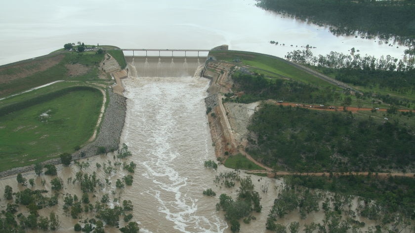 Emerald's Fairbairn Dam overflows