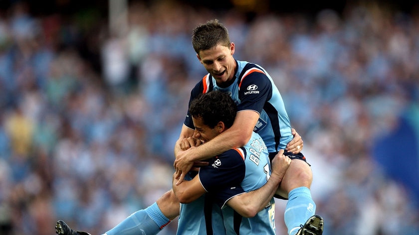 Sydney FC celebrate the opener