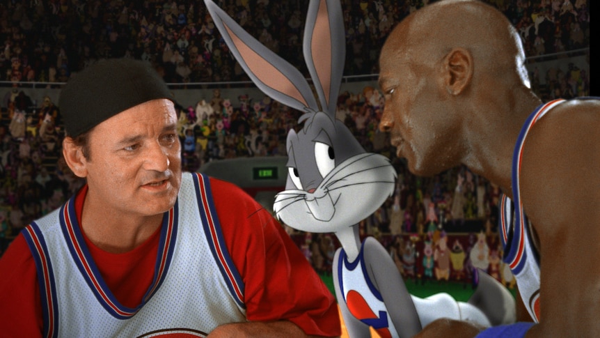 Bill Murray, Bugs Bunny (animated) and Michael Jordan in the movie Space Jam